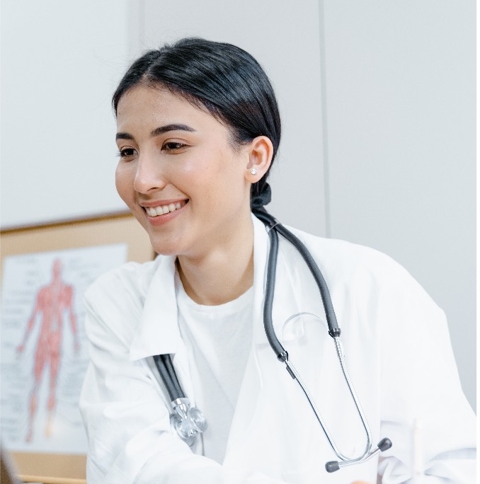 a doctor with a stethoscope on her neck