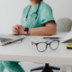 a doctor using MacBook pro