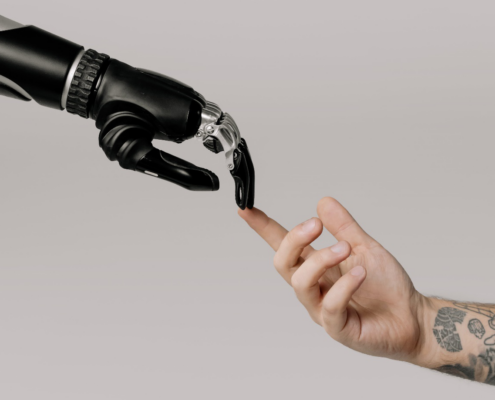 a bionic hand and human hand