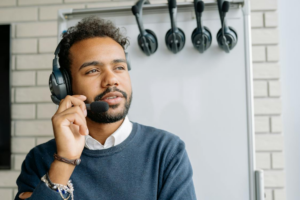 An employee using VoIP for businesses